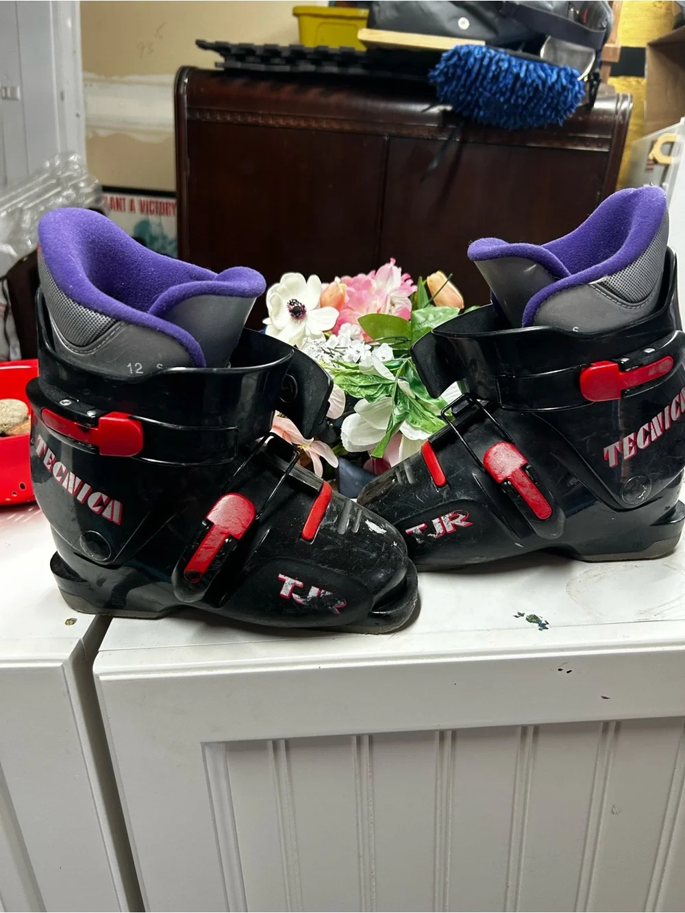 Kids Black Tecnica Ski Boots with Purple Liner and Red Accents